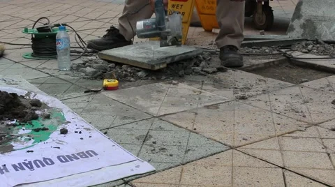 Workers are repairing pavement Stock Footage 58626638