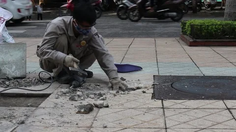 Workers are repairing pavement Stock Footage 58626653