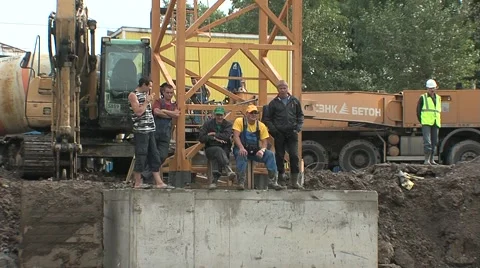 Workers are sitting at a construction site Stock Footage 5165027