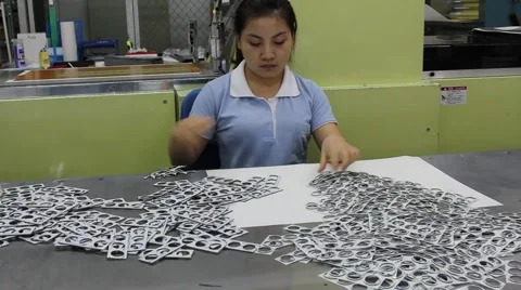 Workers are stripping products Stock Footage 56080492