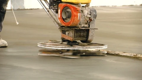 Workers are using concrete polishing machines Stock Footage 100430831