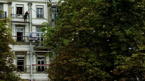 Workers are using elevator in construction site Stock Footage 104668713