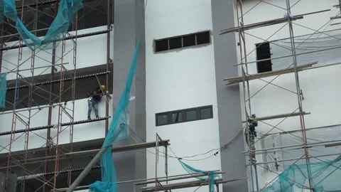 Workers are walking in scaffolding Stock Footage 255125315