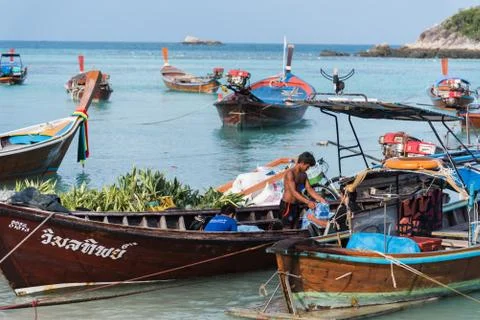 Workers are working on the beach at lipe island Stock Photos