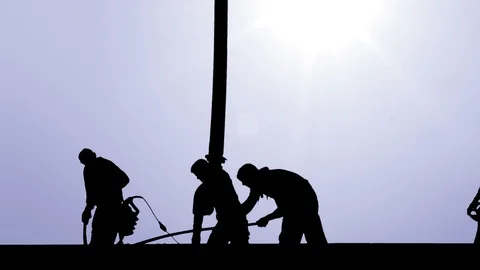 Workers are working on building ceiling, graphic silhouette stylization Stock Footage 88988155