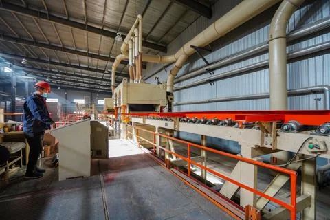 Workers are working nervously on the production line in a sheet metal manuf.. Stock Photos