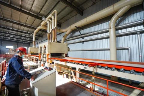 Workers are working nervously on the production line in a sheet metal manuf.. Stock Photos