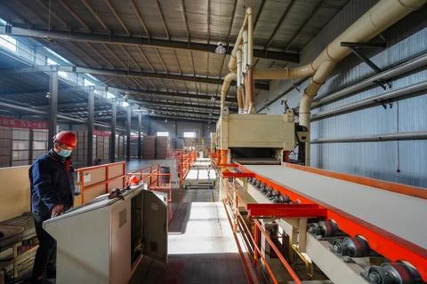 Workers are working nervously on the production line in a sheet metal manuf.. Stock Photos