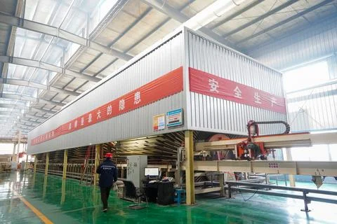 Workers are working nervously on the production line in a sheet metal manuf.. Stock Photos