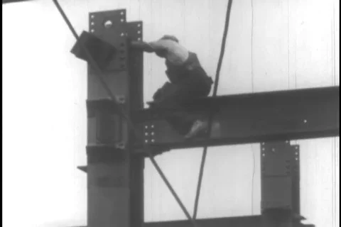 Workers assemble and fix the structural beam - 1930 Stock Footage 104336509