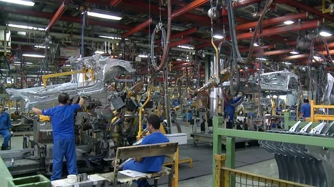 Workers assemble auto parts inside Khodro car factory, Tehran, Iran Stock Footage 119161383