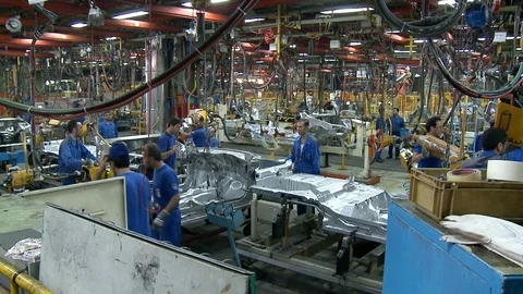 Workers assemble auto parts inside Khodro car factory, Tehran, Iran Stock Footage 119164517
