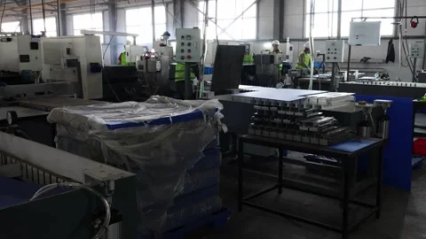 Workers assemble battery parts. Stock Footage 310740452