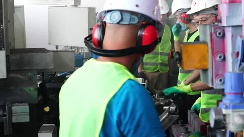 Workers assemble battery parts. Stock Footage 310740469