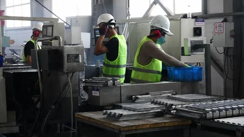 Workers assemble battery parts. Stock Footage 310740470