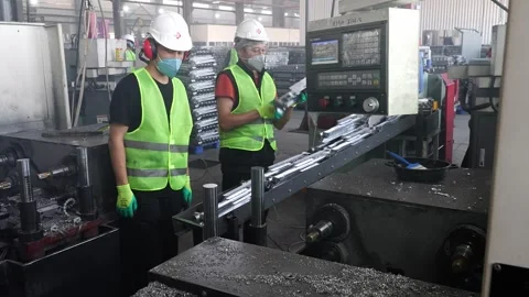 Workers assemble battery parts. Stock Footage 310740559