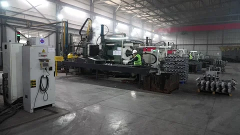 Workers assemble battery parts. Stock Footage 310740686