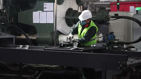 Workers assemble battery parts. Stock Footage 310740750