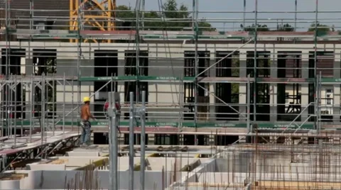 Workers assemble a concrete slab on the construction of a house Stock Footage 40730691
