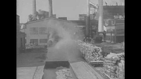 Workers assemble gliders and a pilot flies and lands with a jeep, during World Video stock 139643134