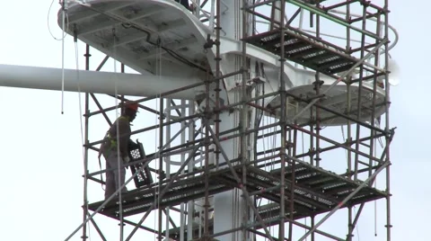 Workers assemble scaffold on a ship mast in a dry dock port 스톡 동영상 61544219