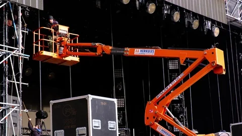 Workers assemble scene using powerful industrial crane. Stock Footage 124088558