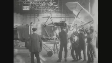 Workers assembling aircraft wings on the aircraft Stock Footage 43311479