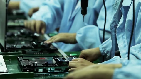 Workers Assembling Laptop Computers on Electronics Production Line Stock Footage 111295543