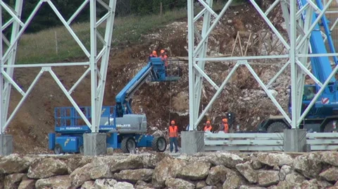 Workers on auto crane, construction site, scaffolding Stock Footage 28527538