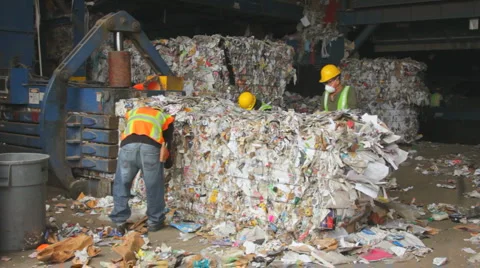WORKERS BALE RECYCLED PAPER Video stock 6526789