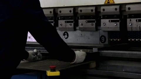 Workers bend metal on the machine Stock Footage 46516866