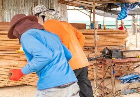 Workers is bending rebars with human force. Stock Photos