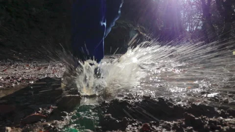 Workers boot splashes on a stream of water Full HD 1080 Cinematic Video stock 146915495
