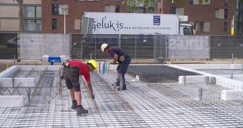 Workers braiding concrete at a building site Netherlands, 4K Stock Footage 111635909