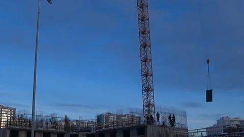 Workers build a formwork for the monolithic walls of the house. Video stock 168156244