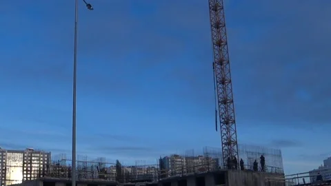 Workers build a formwork for the monolithic walls of the house. Video stock 168156263