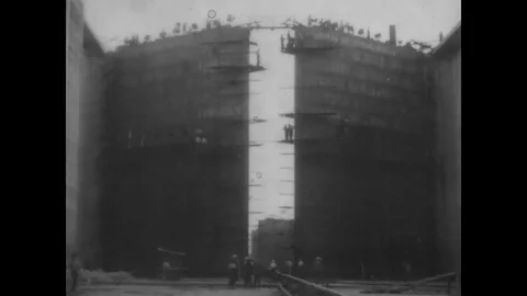 Workers build lock gates for construction on Panama Canal - 1913-1914 Video stock 83661425