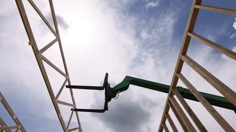 Workers build wooden structure at construction site Video stock 342731456
