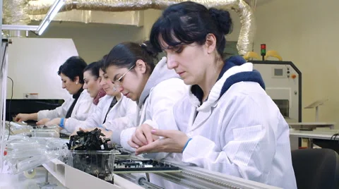 Workers Building Circuit Boards in Electronics Factory Stock Footage 50304994