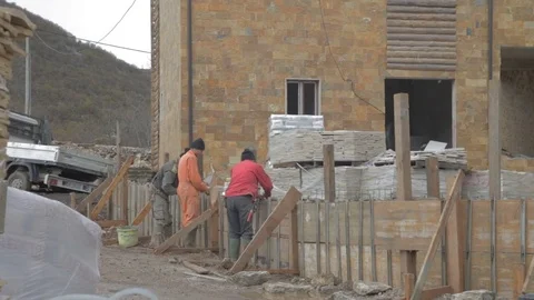 Workers building a wall Stock Footage 73465426