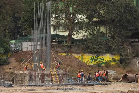 Workers Busy In Making Construction. Stock Photos