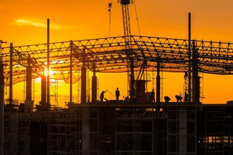 Workers busy operate at Construction site in beginning of building Stock Photos
