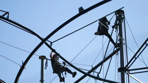 Workers carry out repair work on the attraction. Stock Footage 165415779