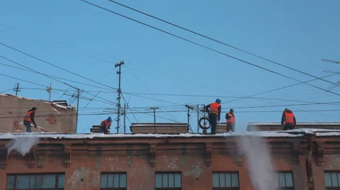 Workers clean the roof from snow Stock Footage 59134243