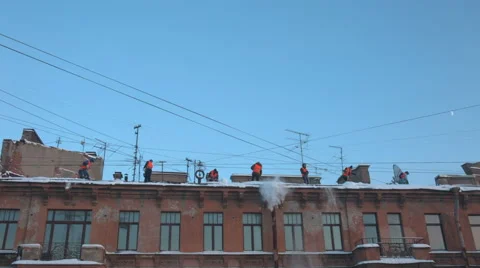 Workers clean the roof from snow Stock-Footage 59134414