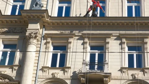 Workers cleaning the ancient facade. Stock Footage 311257789