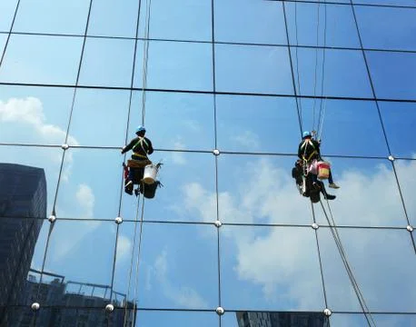 Workers cleaning windows service Stock Photos