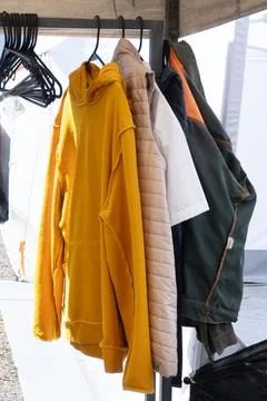 Workers' clothes hanging outside Stock Photos