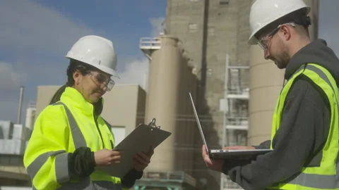 Workers Collaborating Outside Factory 스톡 동영상 208778458