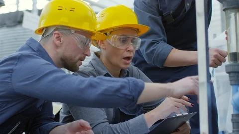 Workers Collecting Data from Fertilizer Dispenser Video stock 90692935